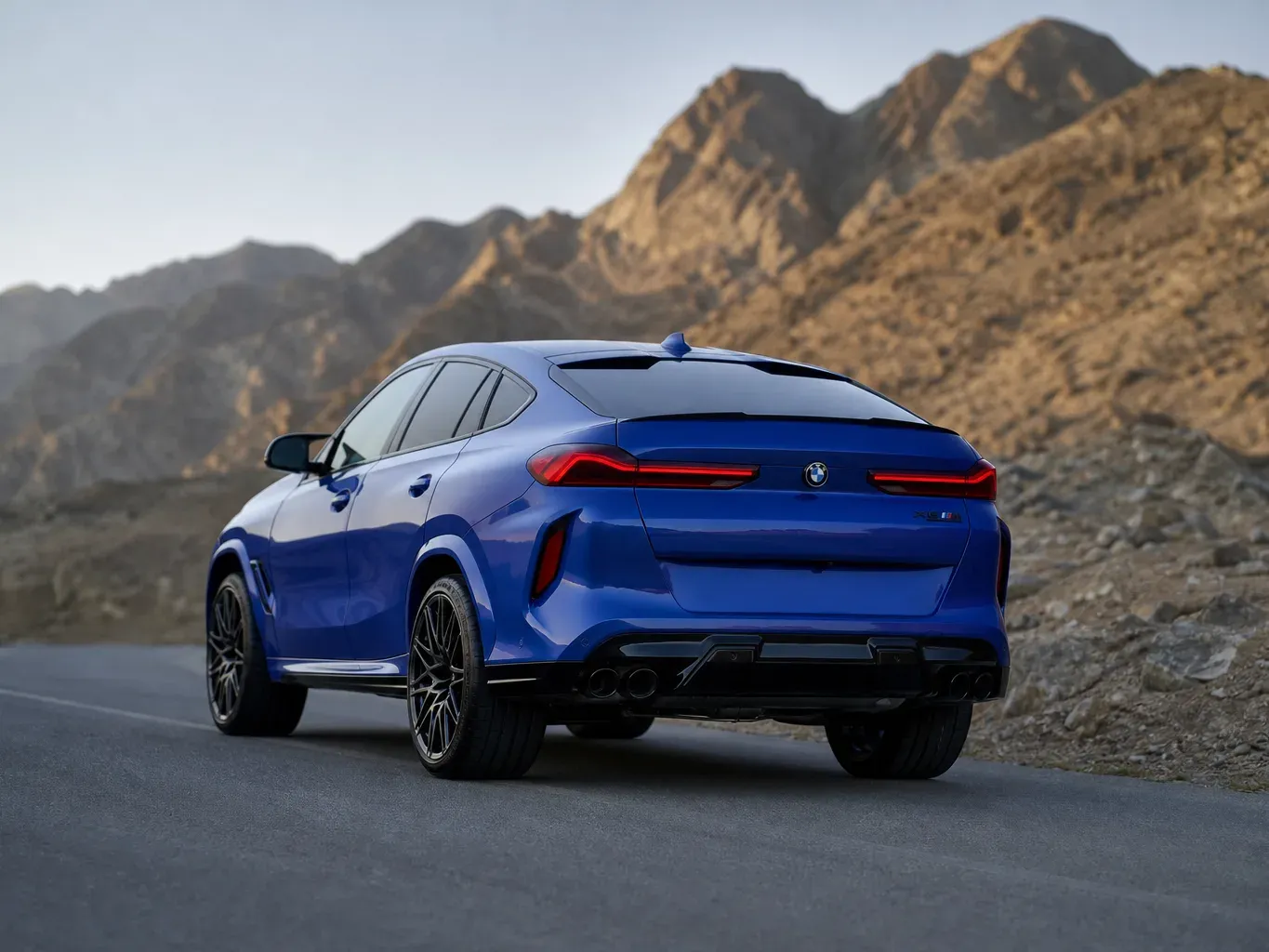 BMW X6 M Competition Blue rear three-quarter view