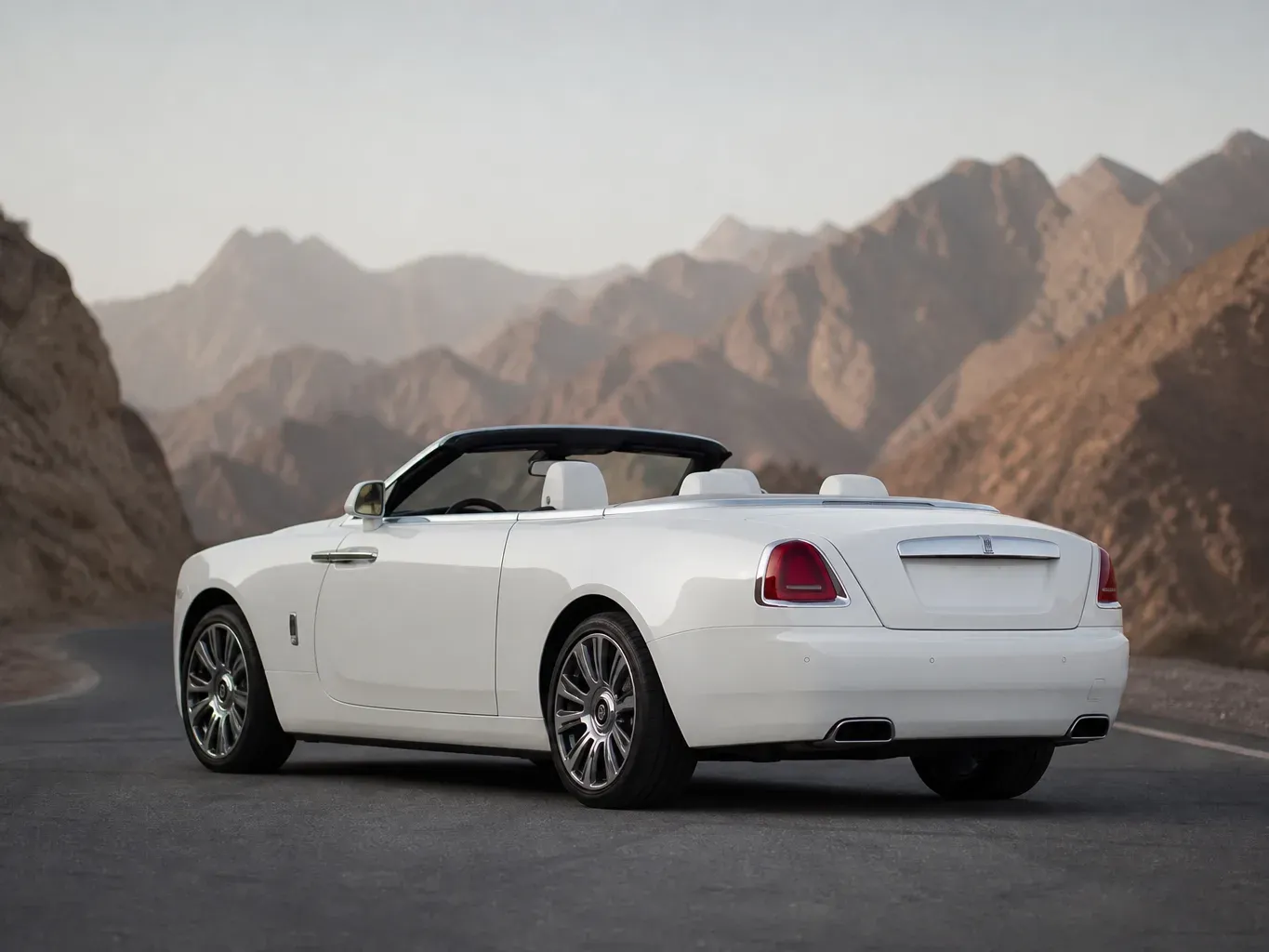 Rolls-Royce Dawn White rear three-quarter view